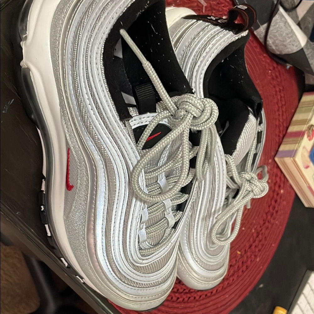 Nike Metallic Silver and Black Shoes with Red Detail